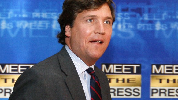FILE - In this Nov. 17, 2007 file photo, political commentator Tucker Carlson arrives for the 60th anniversary celebration of NBC&#039;s Meet the Press at the Newseum in Washington. Fox News Channel s ...