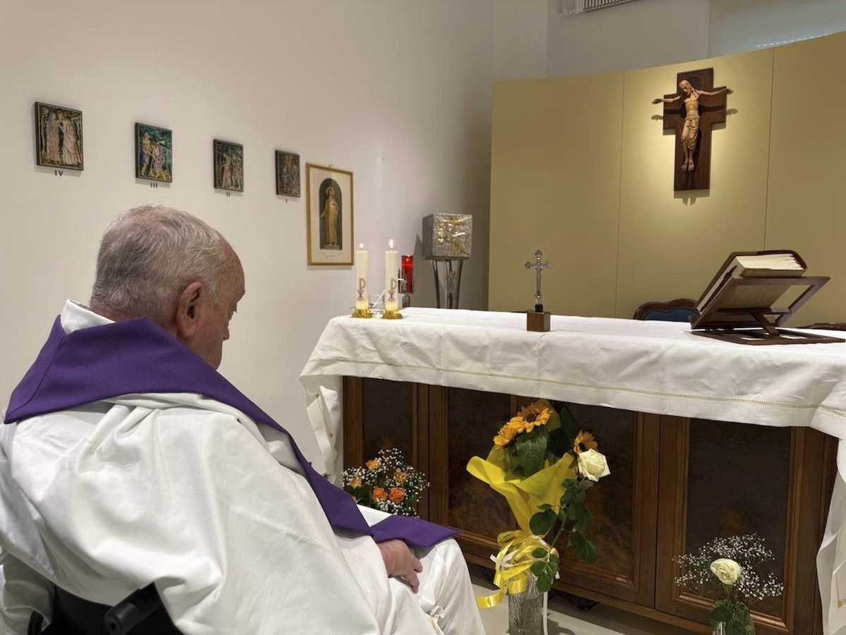 FILE-- This picture released by the Vatican Press Office shows Pope Francis concelebrating a mass inside his private chapel at the Agostino Gemelli Polyclinic in Rome on Sunday, March 16, 2025. (Vatic ...