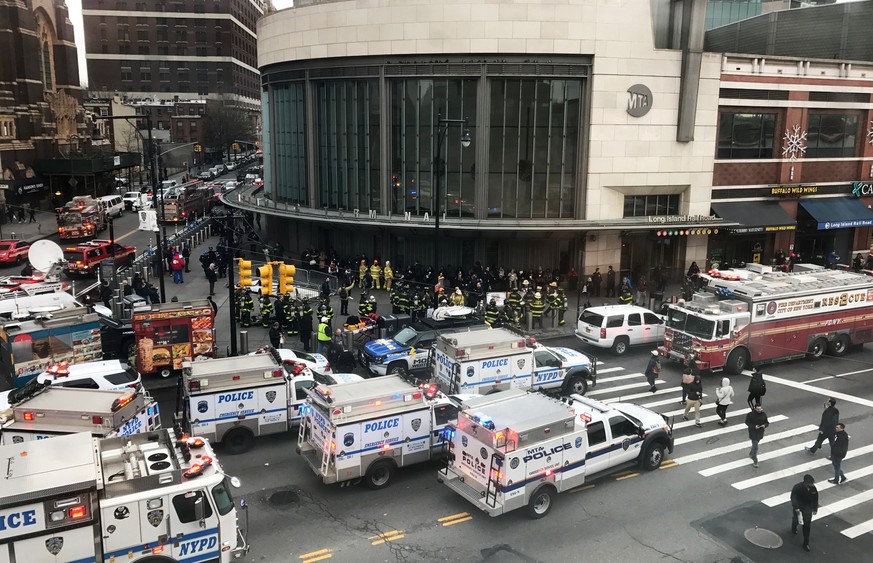 Emergency vehicles gather at the Atlantic Avenue Terminal after a commuter train derailed during the Wednesday morning commute, in New York, U.S., January 4, 2017. REUTERS/Jonathan Oatis