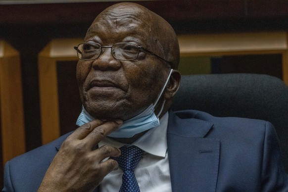 FILE - Former South African President Jacob Zuma sits in the High Court in Pietermaritzburg, South Africa, on Jan. 31, 2022. Beleaguered Zuma has said he is ready to make a surprise return to politics ...