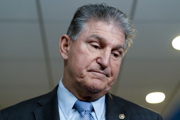 Sen. Joe Manchin, D-W.Va., a key holdout vote on President Joe Biden&#039;s domestic agenda, pauses while speaking to reporters on Capitol Hill in Washington, Wednesday, Oct. 27, 2021. (AP Photo/Andre ...