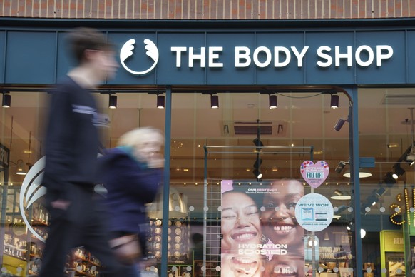 People walk past a Body Shop store in Canterbury, England, Tuesday, Feb. 13, 2024. The Body Shop, the British beauty and cosmetics retail chain, says it&#039;s appointed insolvency administrators afte ...