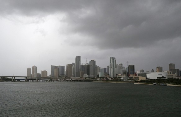 Clouds cover the Miami skyline as the outer bands of Hurricane Irma reached South Florida early Saturday, Sept. 9, 2017 in Miami. Gov. Rick Scott is urging anyone living in an evacuation zone in south ...