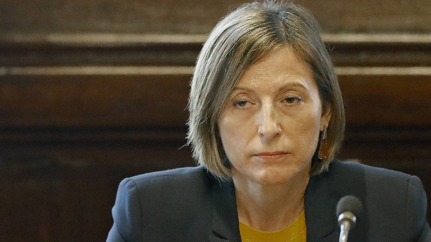 epa06283888 Speaker of the regional Catalan Parliament, Carme Forcadell, attends the meeting of parties spokespeople at the regional Parliament in Barcelona, Catalonia, Spain, 23 October 2017. Forcade ...