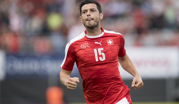 Swiss midfielder Blerim Dzemaili, celebrates after scoring a goal during an international friendly test match between the national soccer teams of Switzerland and Moldova, at the Cornaredo stadium, in ...
