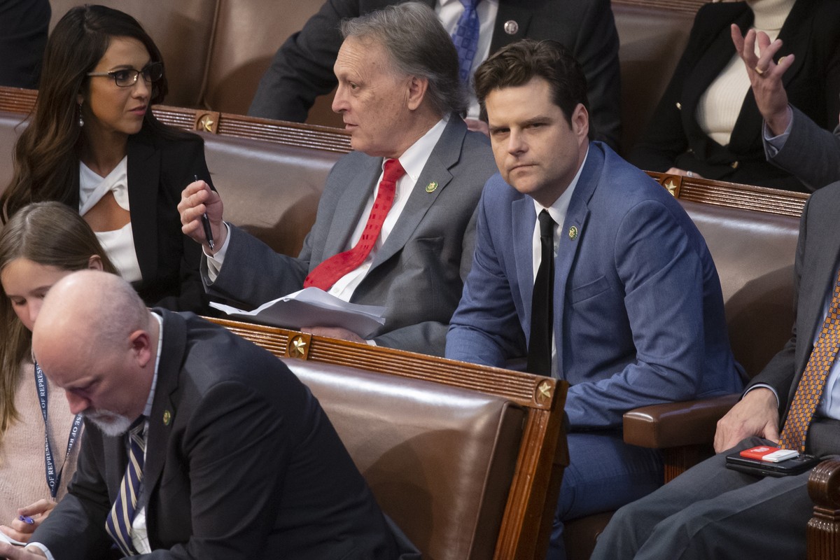 epa10389475 Republican Representative of Florida Matt Gaetz (Back R) sits beside Republican Representative of Arizona Andy Biggs (Back C), Republican Representative of Colorado Lauren Boebert (Back L) ...