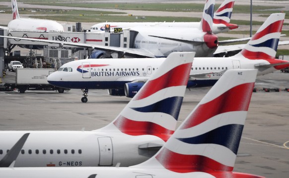 epa08293889 British Airways passenger aircraft at Heathrow Airport Terminal Five in London, Britain, 14 March 2020. The future of British Airways and other airlines is under threat as global travel is ...