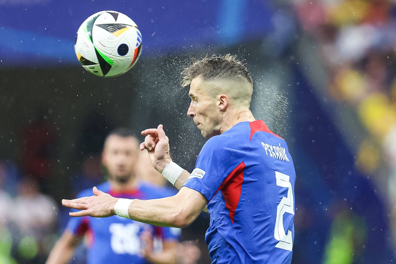 Kopfball von Peter Pekarik Slovakei 02r GER, Slovakia SVK vs. Romania ROU, Fussball Europameisterschaft, UEFA EURO, EM, Europameisterschaft,Fussball 2024, Gruppe E, 3. Spieltag, 26.06.2024 GER, Slovak ...