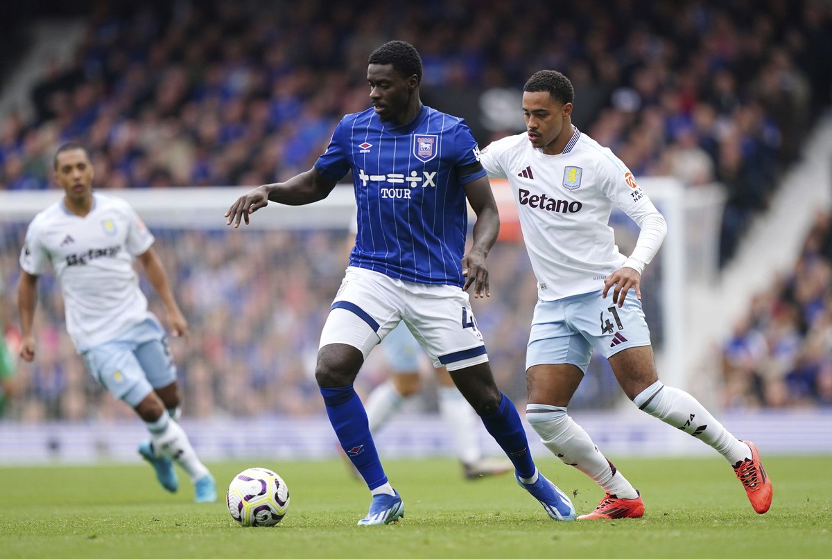 Ipswich Town's Axel Tuanzebe (left) and Aston Villa's Jacob Ramsey in action during the British Premier League soccer match between Ipswich Town and Aston Villa at Portman Road, Ipswich, Eng ...