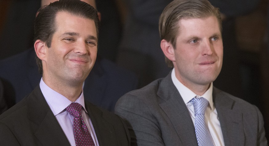 epa05763866 Sons of US President Donald J. Trump; Donald Trump Jr. (L) and Eric Trump (R), attend the announcement of Neil Gorsuch, federal judge serving on the 10th US Circuit Court of Appeals, as Pr ...