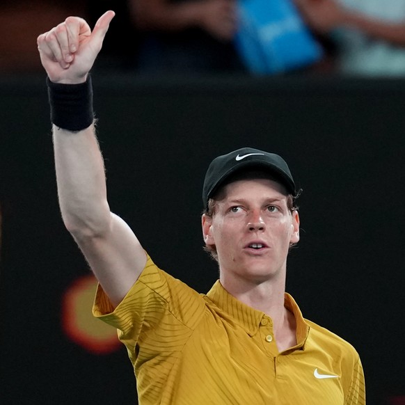 Jannik Sinner of Italy waves after defeating Eliot Spizzirri of the U.S. in their third round match at the Australian Open tennis championship in Melbourne, Australia, Saturday, Jan. 24, 2026. (AP Pho ...