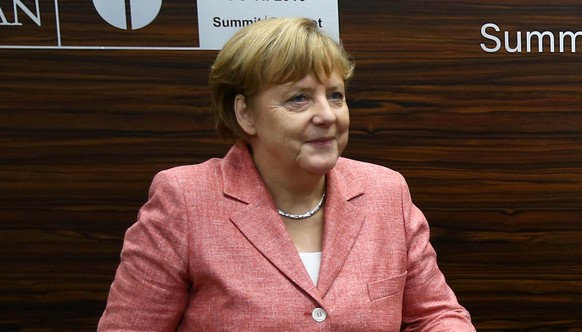 Germany&#039;s Chancellor Angela Merkel meets with Turkey&#039;s President Tayyip Erdogan (R) at the NATO Summit in Warsaw, Poland, July 9, 2016. Kayhan Ozer/Presidential Palace/Handout via REUTERS AT ...