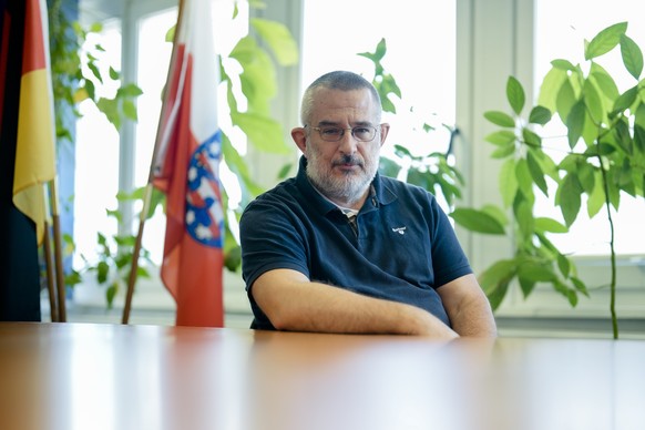 Stephan Kramer, the head of Thuringia&#039;s state domestic intelligence agency uses for a photo in his office at German federal state Thuringia capital Erfurt, Wednesday, July 5, 2023. If the far-rig ...