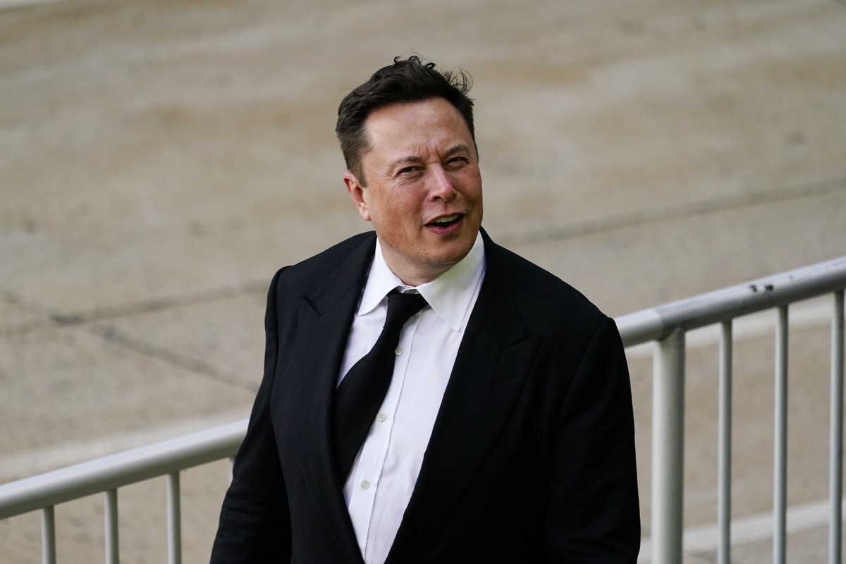 Elon Musk walks from the the justice center in Wilmington, Del., Monday, July 12, 2021. Musk took to a witness stand Monday to defend his company's 2016 acquisition of a troubled company called S ...