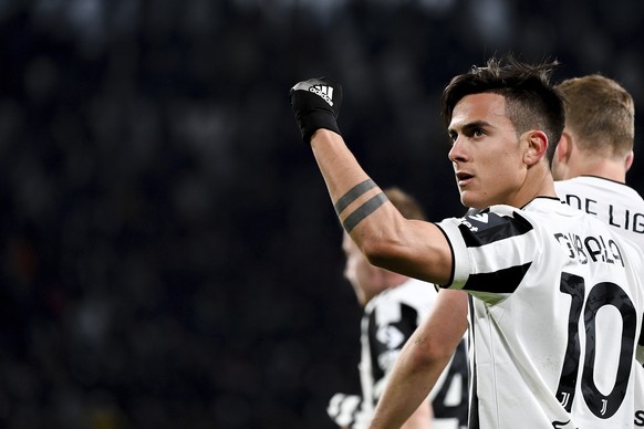 Juventus&#039; Paulo Dybala celebrates after scoring during the Serie A soccer match between Juventus and Genoa, at the Turin Allianz stadium, Italy, Sunday, Dec. 5, 2021. (Marco Alpozzi/LaPresse via  ...