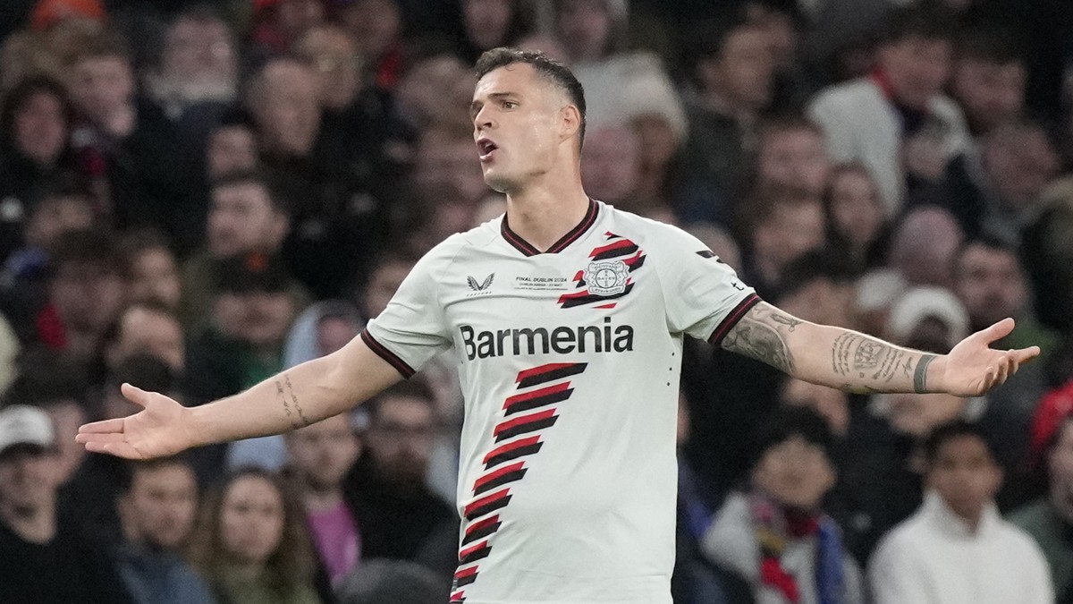 Leverkusen's Granit Xhaka gestures during the Europa League final soccer match between Atalanta and Bayer Leverkusen at the Aviva Stadium in Dublin, Ireland, Thursday, May 23, 2024. (AP Photo/Fra ...