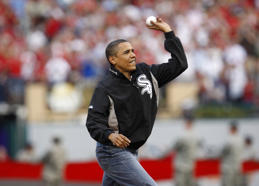 FILE - In this July 14, 2009, file photo, President Barack Obama throws out the ceremonial first pitch during the MLB All-Star baseball game in St. Louis. (AP Photo/Nam Y. Huh, file)
Barack Obama