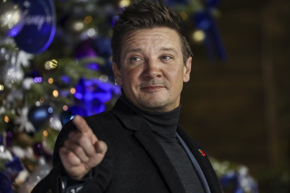 FILE - Jeremy Renner poses for photographers upon arrival at the UK Fan Screening of the film &quot;Hawkeye,&quot; in London, Thursday, Nov. 11, 2021. Renner is being treated for serious injuries that ...