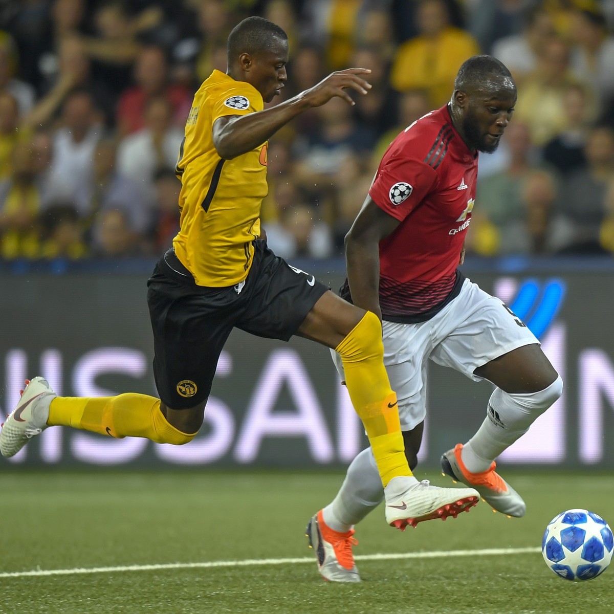 Young Boys' Mohamed Ali Camara, left, fights for the ball against Manchester United's Romelu Lukaku, right, during the UEFA Champions League group H matchday 1 soccer match between Switzerla ...