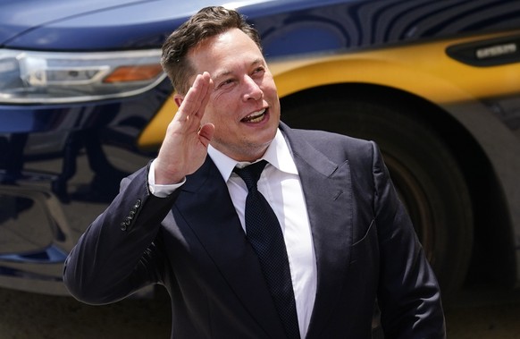 FILE - Tesla CEO Elon Musk departs from the justice center in Wilmington, Del., Tuesday, July 13, 2021. Democrats are hoping to raise revenue for their legislative agenda by taxing the assets of billi ...