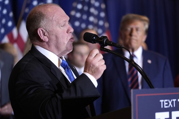 Tom Homan speaks as Republican presidential candidate former President Donald Trump listens at a primary election night party in Nashua, N.H., Tuesday, Jan. 23, 2024. (AP Photo/Matt Rourke)