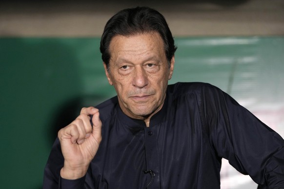 FILE - Pakistan&#039;s former Prime Minister Imran Khan gives a press conference at his home, in Lahore, Pakistan, on May 18, 2023. A Pakistani court on Saturday July 13, 2024 overturned the convictio ...