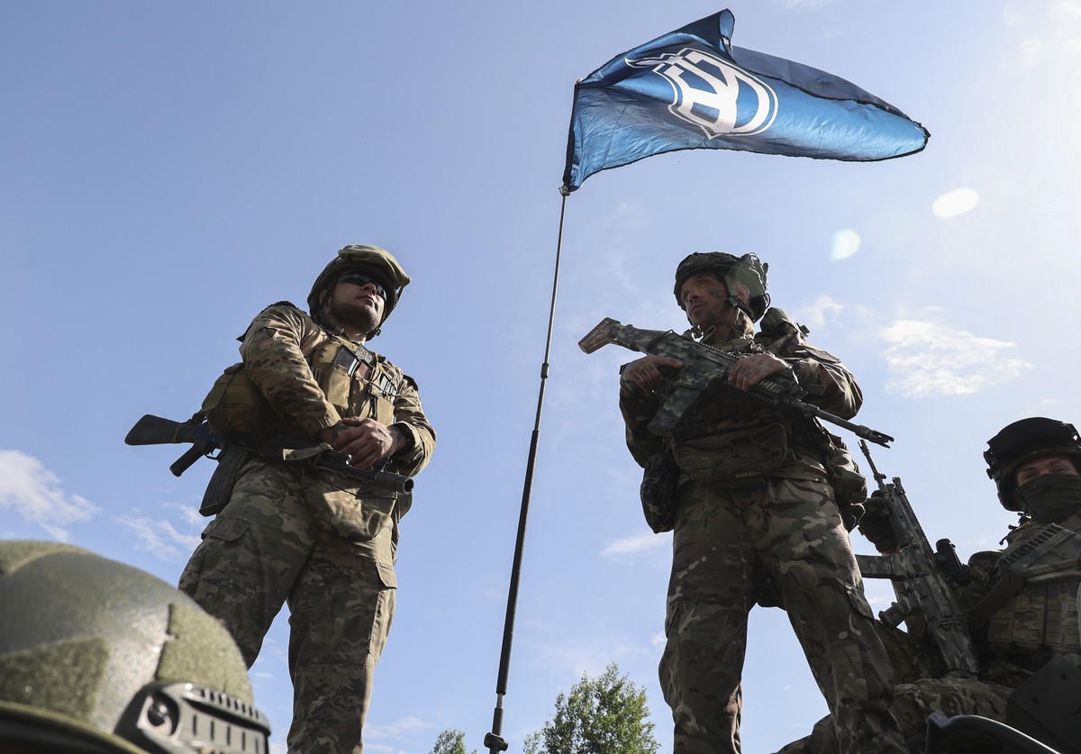 epa10650558 Members of the 'Russian Volunteer Corps' and 'Freedom of Russia Legion' hold a meeting with the media not far from the Ukraine-Russia border in Kharkiv's area, nor ...