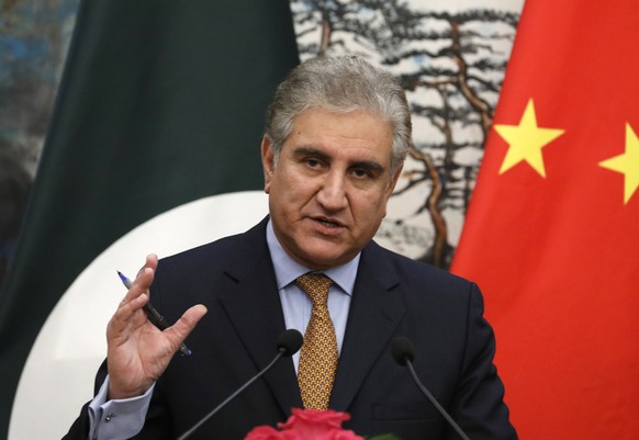 epa07448245 Pakistan Foreign Minister Shah Mehmood Qureshi speak to reporters during a press conference at the Diaoyutai State Guesthouse in Beijing, China, 19 March 2019. According to reports, Quresh ...