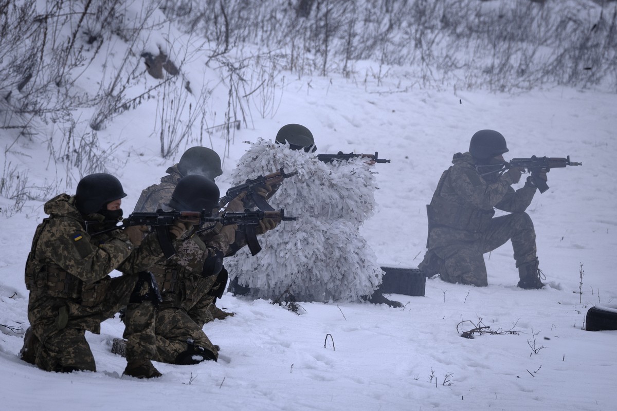 Members of the pro-Ukrainian Russian ethnic Siberian Battalion practice at a military training close to Kyiv, Ukraine, Wednesday, Dec. 13, 2023. Ukraine's military has formed a battalion of soldi ...