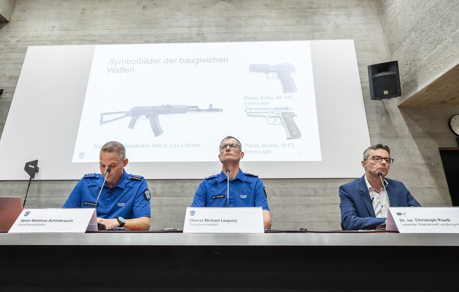 Head of the Aargau Stationed Police Division Matthias Schildknecht, Aargau Canton Police Commander, Michael Leupold and Senior Public Prosecutor Lenzburg-Aargau Christoph Ruedi, left to right, attend  ...