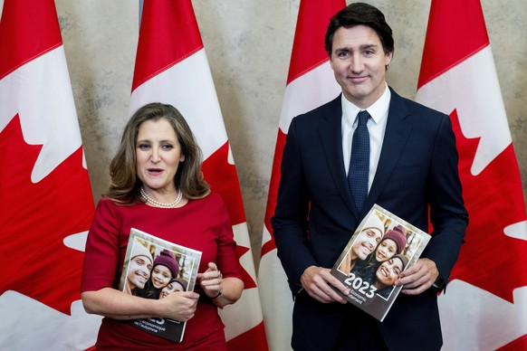 Deputy Prime Minister and Minister of Finance Chrystia Freeland, left, and Prime Minister Justin Trudeau take part in a photo opportunity during the Fall Economic Statement on Parliament Hill in Ottaw ...