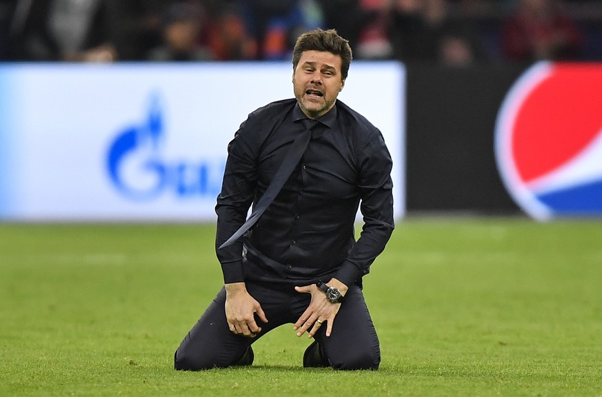 Tottenham manager Mauricio Pochettino celebrates on the pitch after his team scored their third goal during the Champions League semifinal second leg soccer match between Ajax and Tottenham Hotspur at ...