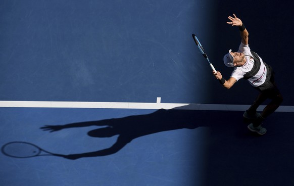 Croatia&#039;s Borna Coric serves to France&#039;s Lucas Pouille during their fourth round match at the Australian Open tennis championships in Melbourne, Australia, Monday, Jan. 21, 2019. (AP Photo/A ...