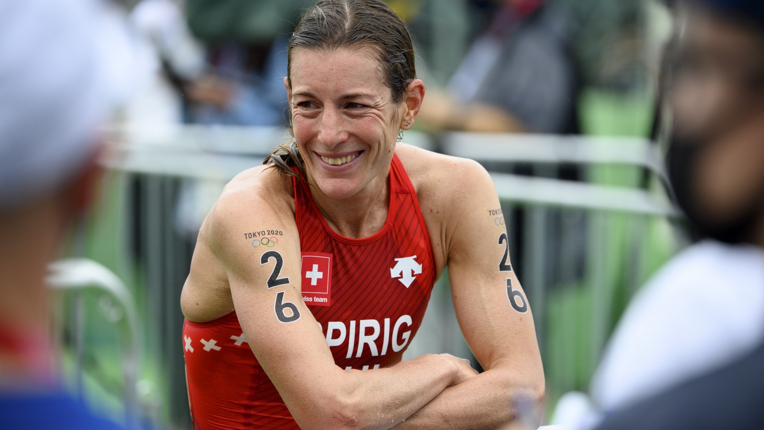 ARCHIV -- ZUM RUECKTRITT DER SCHWEIZER TRIATHLETIN NICOLA SPIRIG --- Nicola Spirig of Switzerland smiles as she speaks to journalists after the women&#039;s individual triathlon competition at the 202 ...