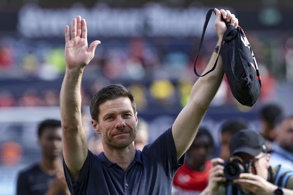epa12091887 Head coach Xabi Alonso of Leverkusen is honoured and bid farewell at his last home game as coach for Leverkusen after the German Bundesliga soccer match between Bayer 04 Leverkusen and Bor ...