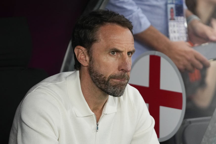 England&#039;s manager Gareth Southgate sits at the bench prior to a Group C match between Denmark and England at the Euro 2024 soccer tournament in Frankfurt, Germany, Thursday, June 20, 2024. (AP Ph ...