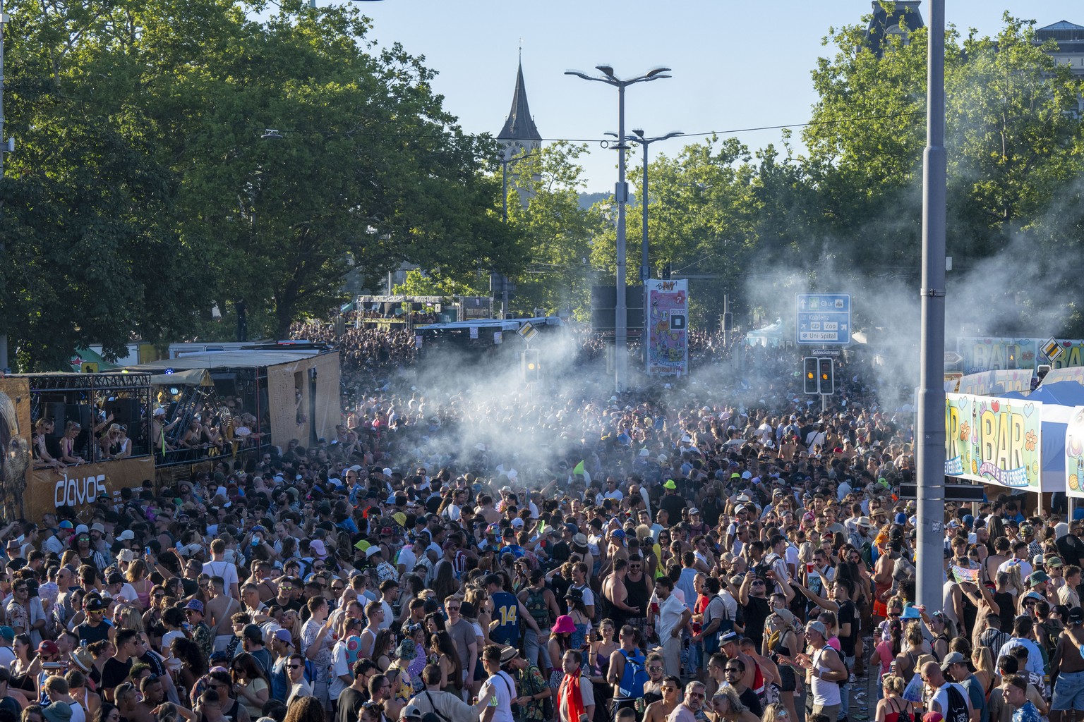 Thousands of participants dancing through the streets during the 31th Street Parade in the city center of Zurich, Switzerland, Saturday, August 10, 2024. The annual dance music event Street Parade run ...