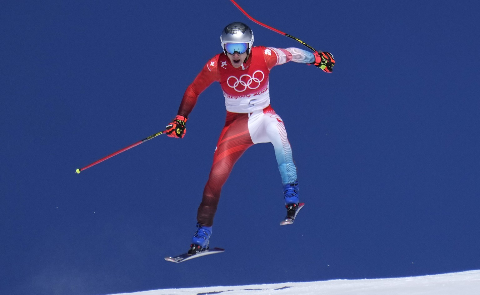 Marco Odermatt, of Switzerland makes a jump during a men&#039;s downhill training run at the 2022 Winter Olympics, Thursday, Feb. 3, 2022, in the Yanqing district of Beijing. (AP Photo/Robert F. Bukat ...
