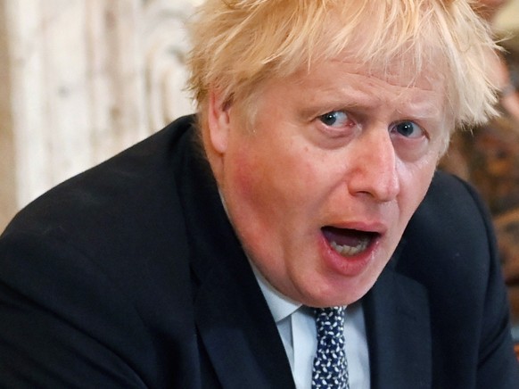 epa09971584 British Prime Minister Boris Johnson (L) chairs a Cabinet meeting at 10 Downing Street in London, Britain, 24 May 2022. Johnson is under pressure over &#039;party gate&#039; allegations fo ...