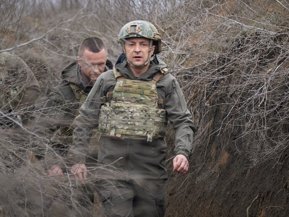 epa09124883 A handout photo made available by the Ukrainian Presidential Press Service shows Ukraine&#039;s President Volodymyr Zelensky on his working visit to the eastern Ukrainian conflict zone, 09 ...