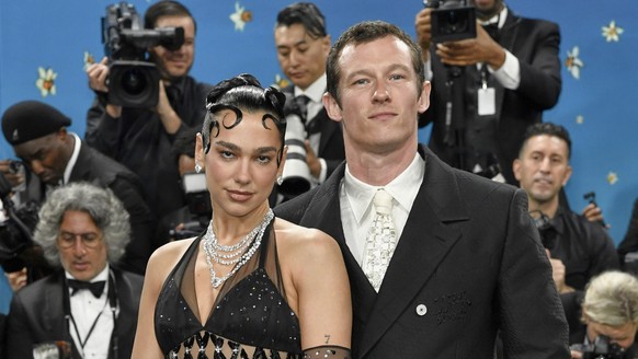 FILE - Dua Lipa, left, and Callum Turner attend The Metropolitan Museum of Art's Costume Institute benefit gala on May 5, 2025, in New York. (Photo by Evan Agostini/Invision/AP, File)
People Dua  ...