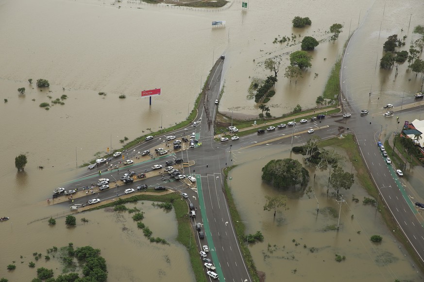 epa07342641 An aerial view of stranded vehicles at a flooded intersection in Townsville, Queensland, Australia, 04 February 2019. Hundreds of people are still waiting for help as evacuation centers fi ...