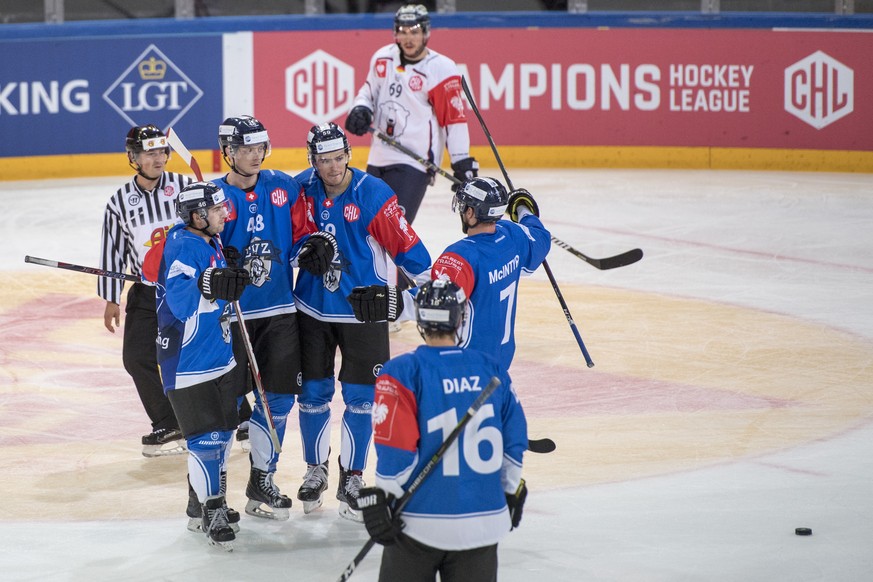 The players from Zug reacts after the 1:1 goal during the Champions Hockey League group D match between Switzerland&#039;s EV Zug and Eisbaeren Berlin from Germany, in Zug, Switzerland, Friday, Septem ...