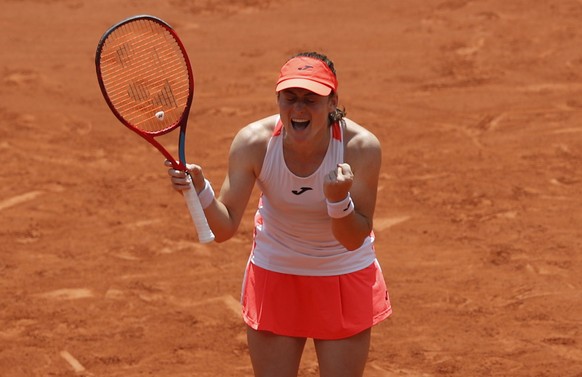 epa09254771 Tamara Zidansek of Slovenia celebrates winning her the quarter final match against Paula Badosa of Spain at the French Open tennis tournament at Roland Garros in Paris, France, 08 June 202 ...