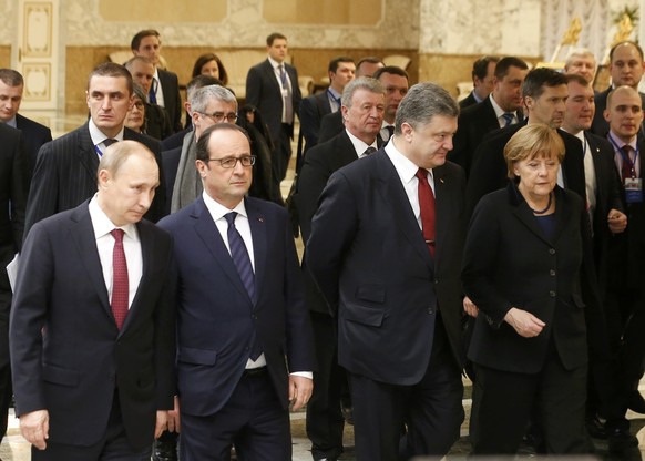 Putin gegen den Rest: Der russische Präsident, Francois Hollande, Petro Poroschenko und Angela Merkel (von links nach rechts).