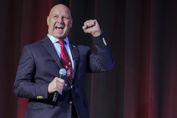 Pennsylvania GOP gubernatorial nominee Doug Mastriano gestures as he rallies with Florida Governor Ron DeSantis, not pictured, in Pittsburgh, Friday, Aug. 19, 2022. (Steven M. Falk/The Philadelphia In ...