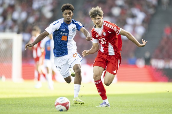 Pantaleo Creti (GC), left, against Dalpiaz Magnus (Bayern Munich), right, during the soccer friendly game between Switzerland�s Grasshopper Club Zuerich against Germany�s FC Bayern Munich in the Letzi ...