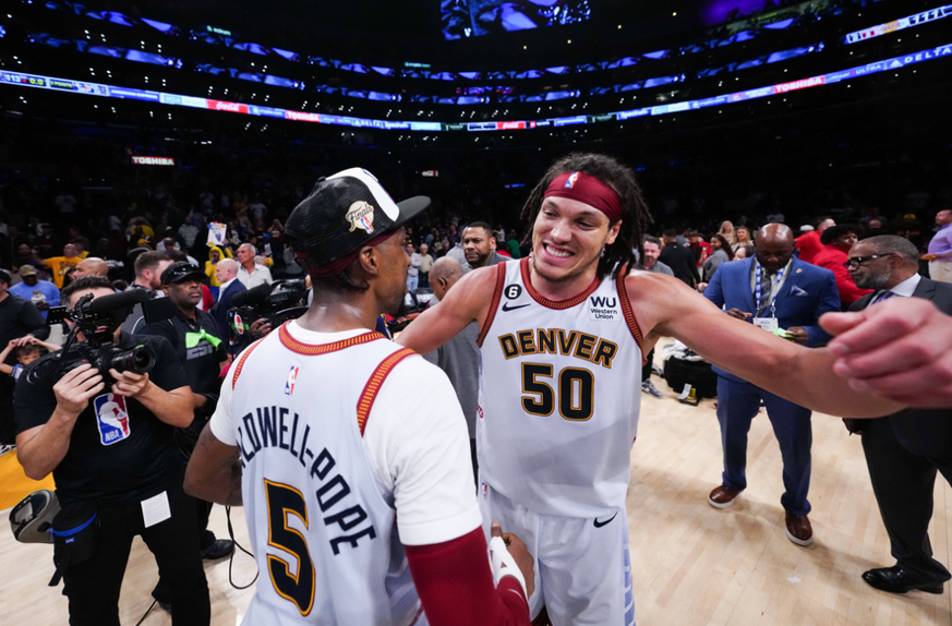 NBA, Basketball Herren, USA Playoffs-Denver Nuggets at Los Angeles Lakers May 22, 2023; Los Angeles, California, USA; Denver Nuggets forward Aaron Gordon (50) and guard Kentavious Caldwell-Pope (5) ce ...