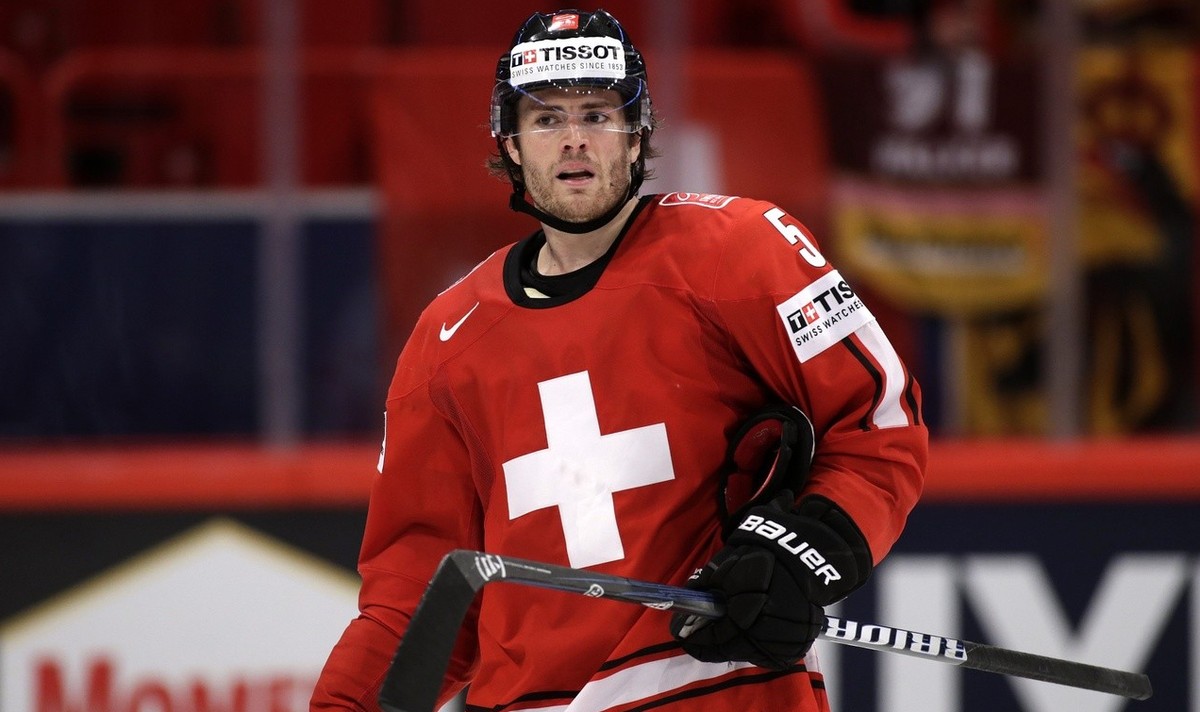 Switzerland's Severin Blindenbacher looks on his teammates, during the IIHF Ice Hockey World Championships preliminary round game Switzerland vs Denmark at the Globe Arena in Stockholm, Sweden, o ...