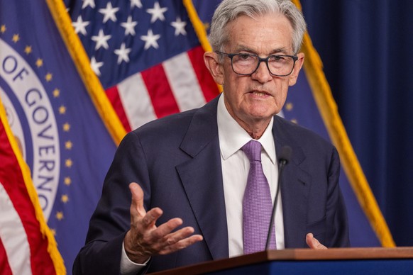 epa11612650 US Federal Reserve Board Chairman Jerome Powell responds to a question from the news media after the Fed cut its benchmark interest rate half-point following its two-day conference at the  ...